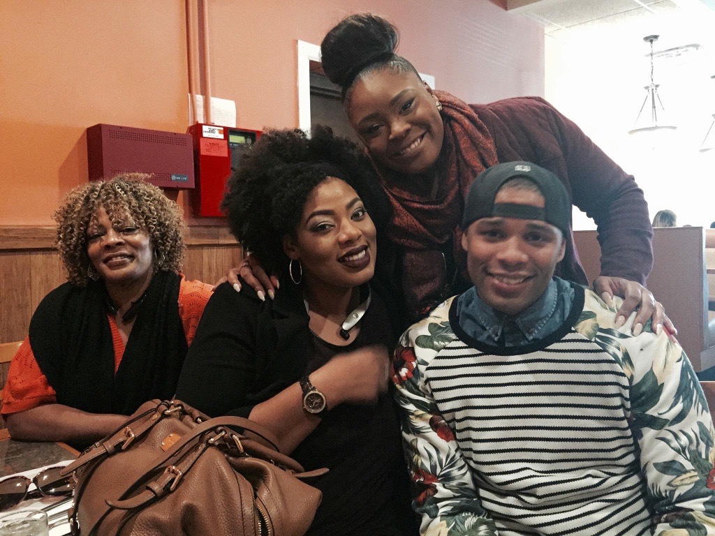 Johnathan at 29 and already a rock star salesman with some of his biggest supporters. From left, his mother Shirley and sisters Naleasha and Tyler.