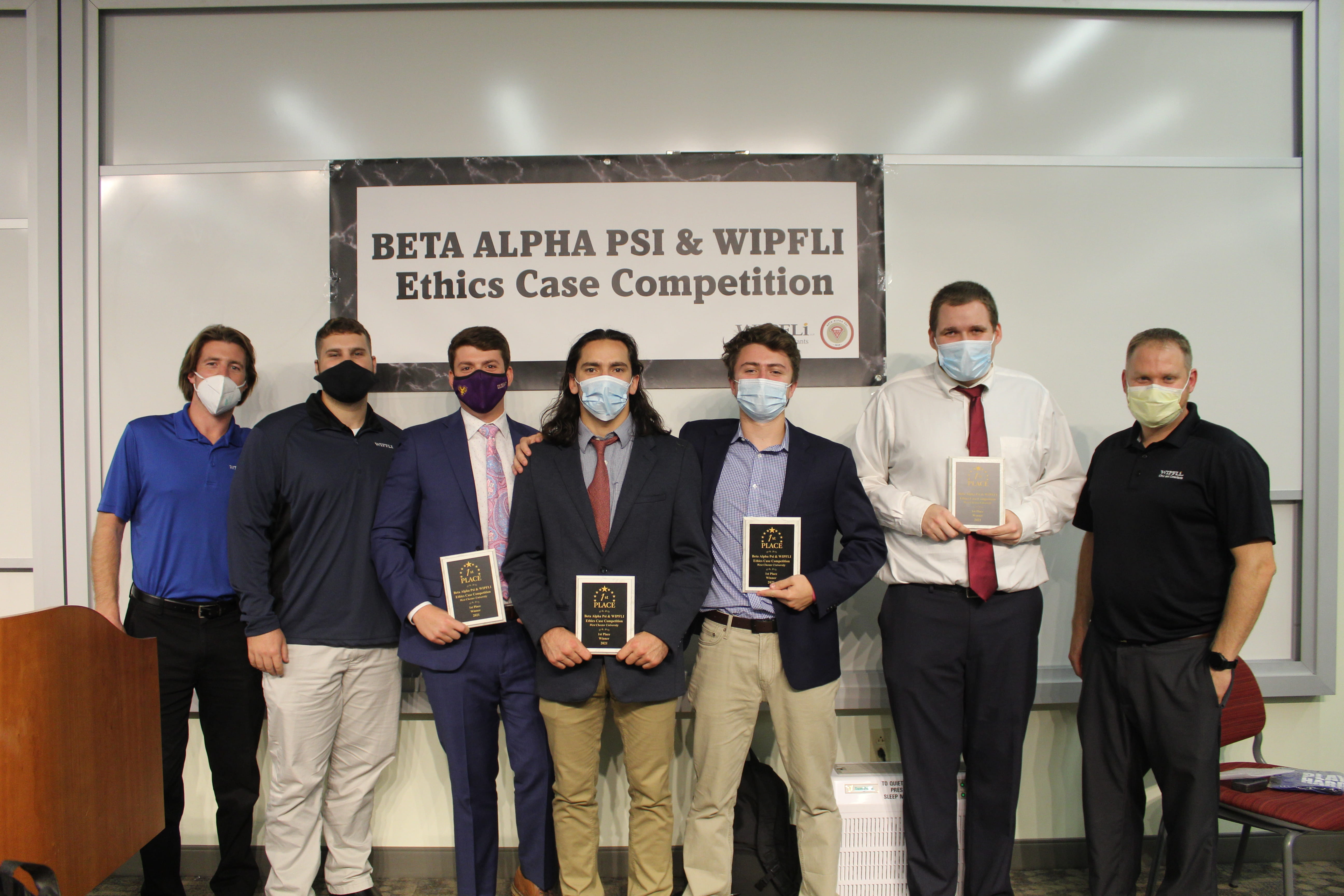 West Chester’s Finest, the other winning team with judges. From left, Wipfli’s Mike Rice and Mark Funk, competitors Brendan Keane, Nick D'Angelo, Nate Frankel, Daniel Gauntlett and judge Kevin Paul.