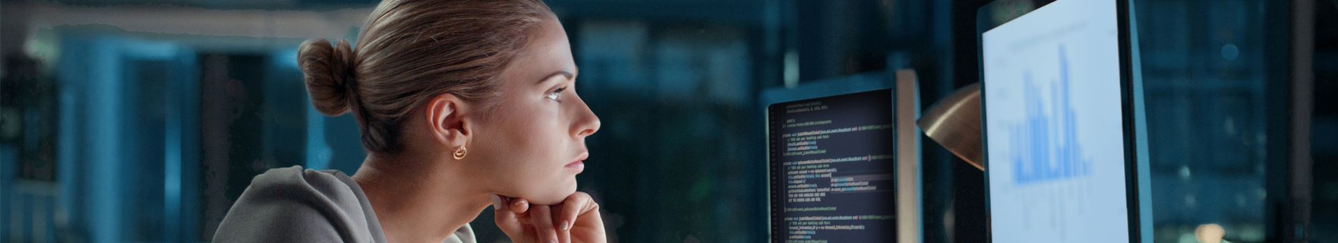 woman looking at a graph on a computer