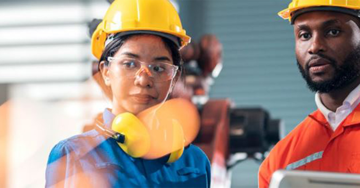 Two manufacturers in hard hats