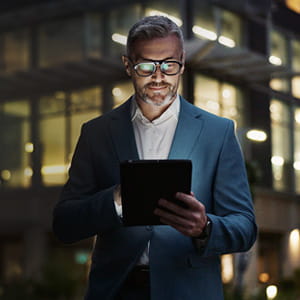 man looking at tablet