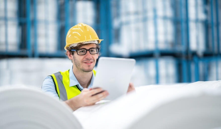 Worker check product before shipping.