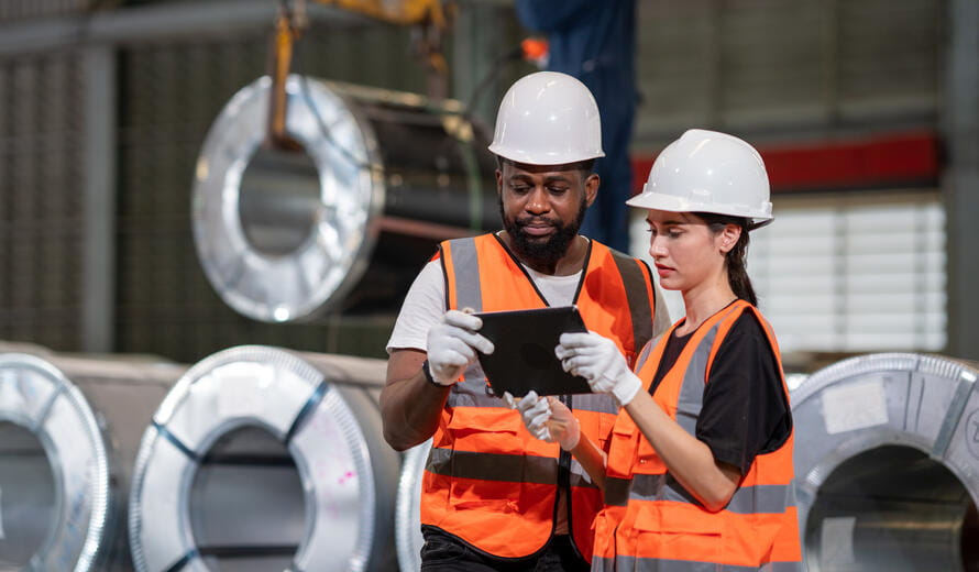 Professional photograph depicting workers in a manufacturing environment