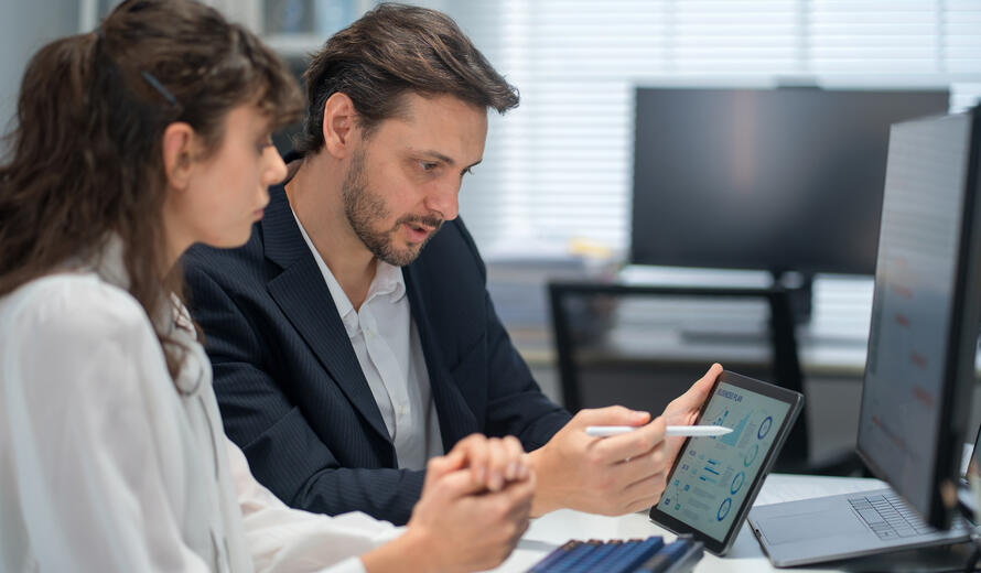 Colleagues working on computers.