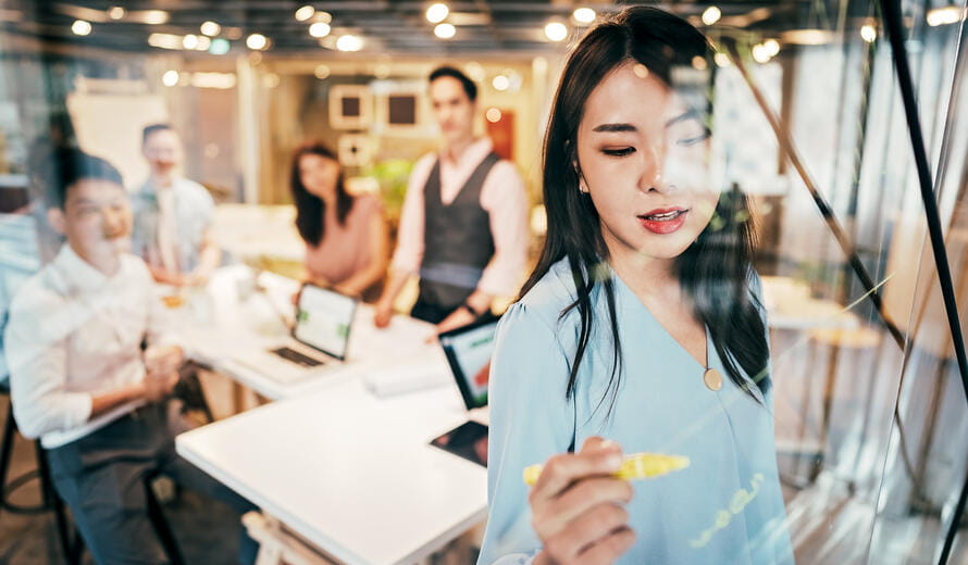 Young Group Of Professionals Developing Business Strategy and Providing The Business Plan