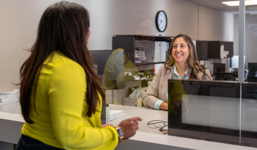 woman at a front desk