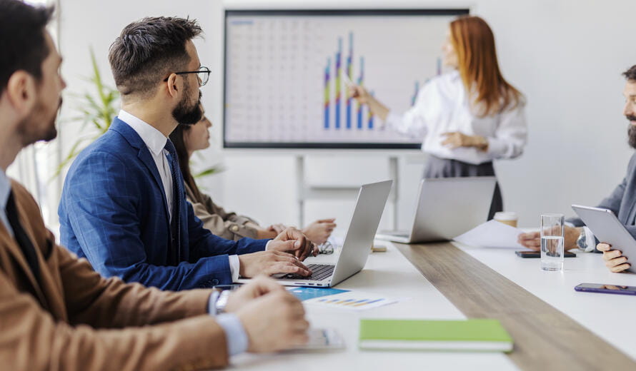 woman presenting graphs