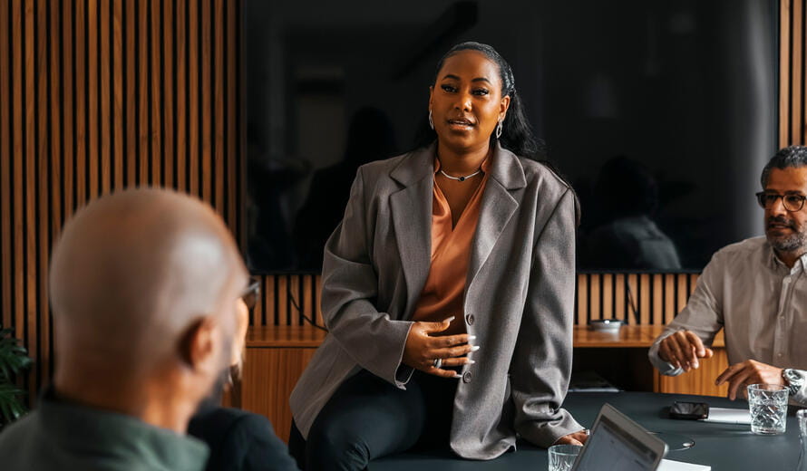 a woman talking to a man