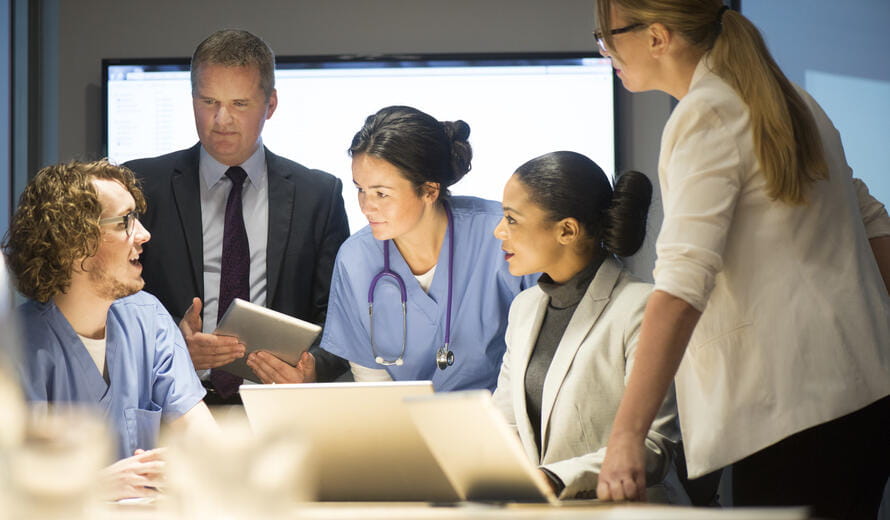 medical team hear presentations from business