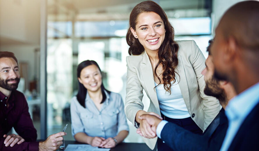 man and woman shaking hands
