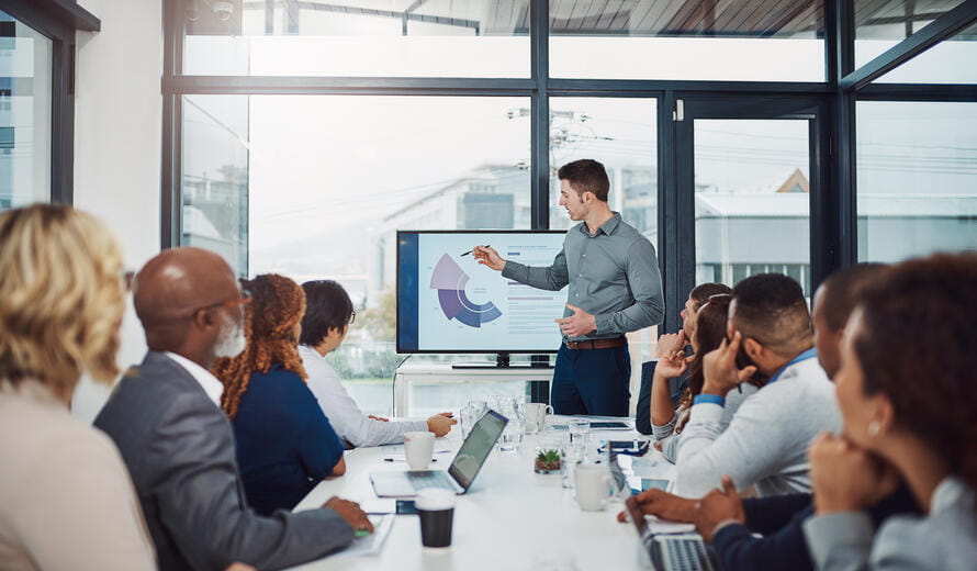 Cropped shot of a handsome businessman giving a presentation in the boardroom