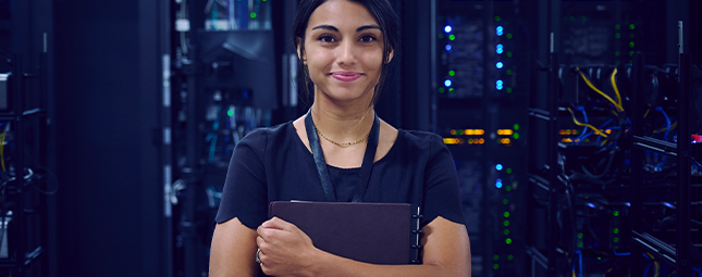 proud woman standing in front of a server