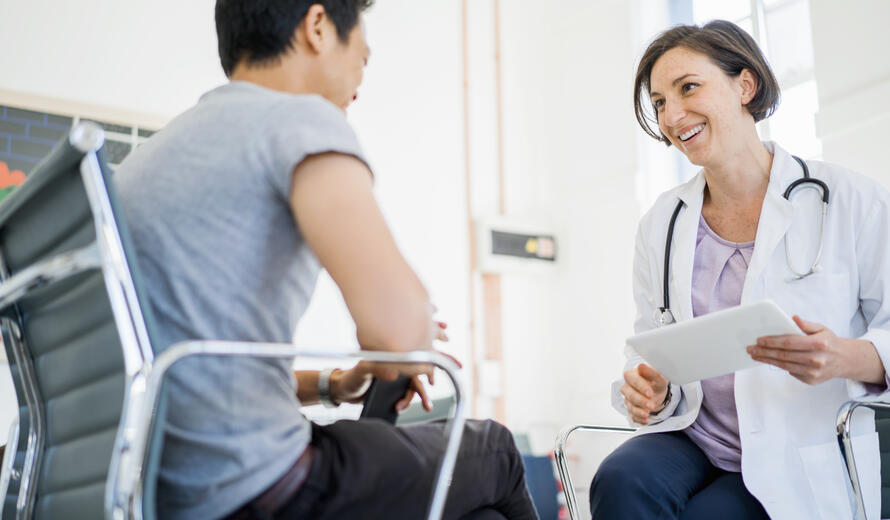 doctor talking with patient