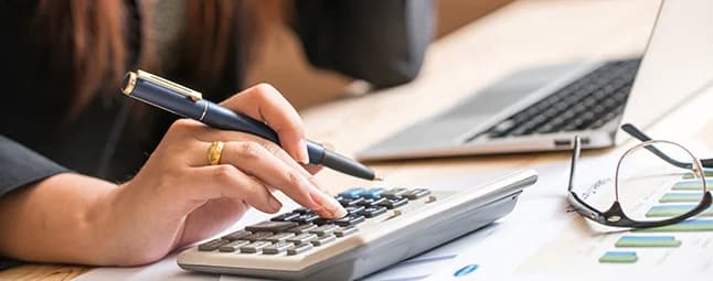 Accountant punching numbers